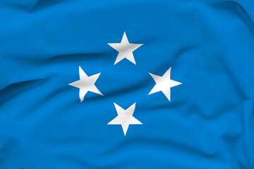 Micronesia national flag, folds and hard shadows on the canvas