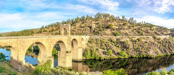 View at the ancient Roman bridge over Tajo river in Alcantara, Spain