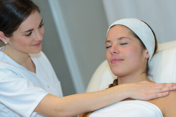 beautiful young woman getting spa massage