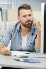 businessman having trouble with a client on the phone