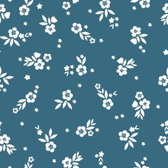 seamless vintage pattern. white flowers and leaves. blue background. vector texture. trendy print for textiles and wallpaper.