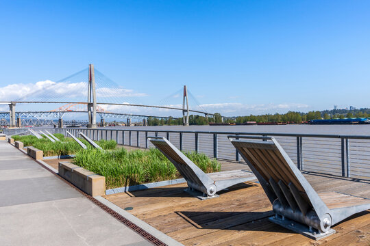 Westminster Pier Park. SkyBridge spans the Fraser River and connects New Westminster with Surrey. British Columbia, Canada.