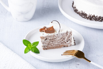 Cheesecake and cup of coffee on light table. Coffee and cake. Horizontal view