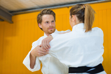Obraz premium portrait of couple and martial artist on training