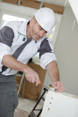 portrait of worker at plastering work