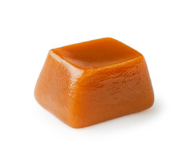 Caramel cubes isolated on white background.