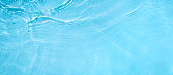 Transparent blue clear water wave surface texture with splashes and bubbles. Abstract summer banner...