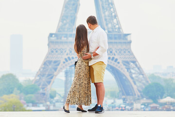 Happy romantic couple enjoying their trip to Paris, France