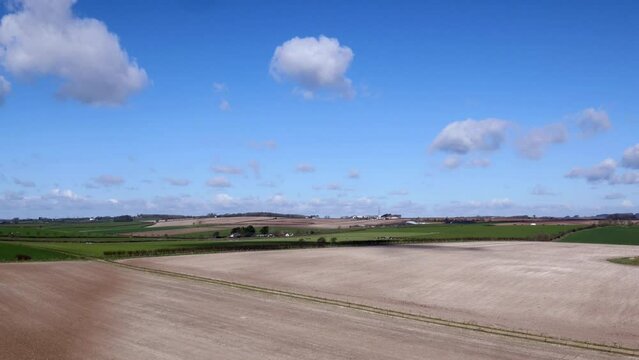 Descending Drone Shot of Agricultural Farmland and Fields