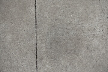 simple gray concrete slab with one vertical joint