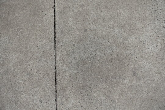 simple gray concrete slab with one vertical joint