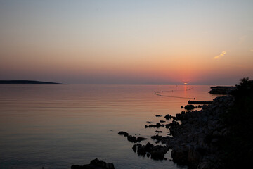 Sunset on the shore of the Adriatic Sea - 509753425