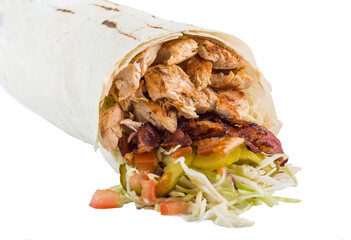 Shawarma, doner, kebab with chicken and bacon and vegetables. Isolated.
