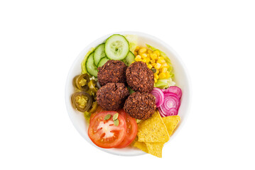 Falafel with vegetables and nachos. Isolated. Top view