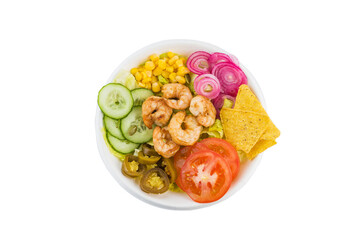 Vegetables with fried shrimps and nachos. Isolated. Top view