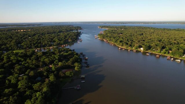 Aerial footage of Cedar Creek Lake in Texas east side with boat docks.