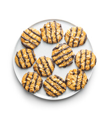 Chip cookies with peanuts and chocolate strips isolated on white background.