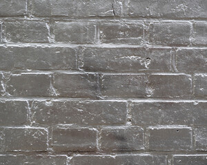 the brick wall is painted silver gray. copy space