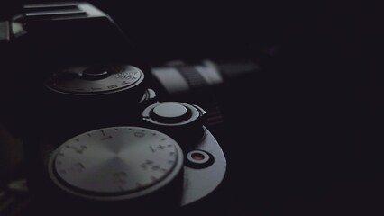 Professional digital camera, on black , photography or creativity concept © Nazar 