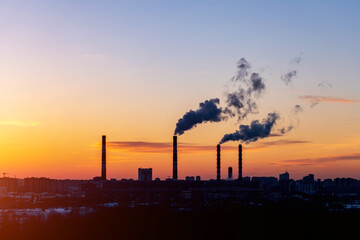 Factory pipe polluting air, smoke from chimneys. environmental problems, ecological theme.