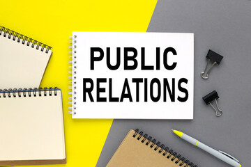 PUBLIC RELATIONS CONCEPT on multicolored yellow and gray background