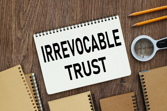 Irrevocable Trust Document With Text On Wooden Background