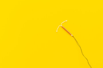 Intrauterine contraceptive device closeup. Birth control contraception concept