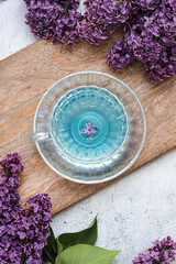 Blue tea around the lilac 