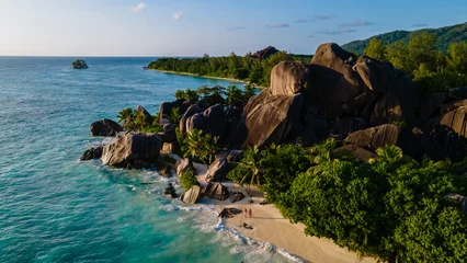 Poster Anse Source D'Agent, La Digue Island, Seychelles Anse Source d'Argent beach, La Digue Island, Seyshelles, Drone aerial view of La Digue Seychelles bird eye view.of tropical Island