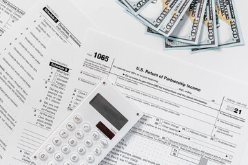 Annual tax form under US law with money cash. Tax payment season