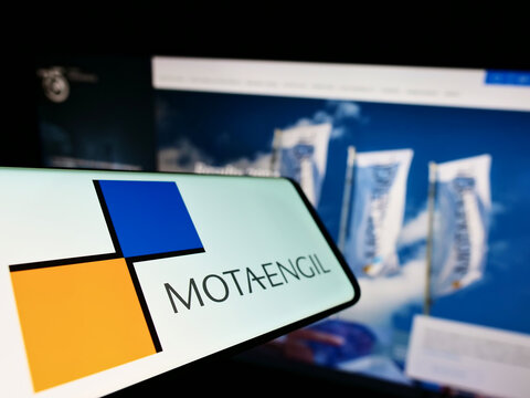 Stuttgart, Germany - 06-06-2022: Mobile phone with logo of infrastructure company Mota-Engil SGPS S.A. on screen in front of business website. Focus on left of phone display.