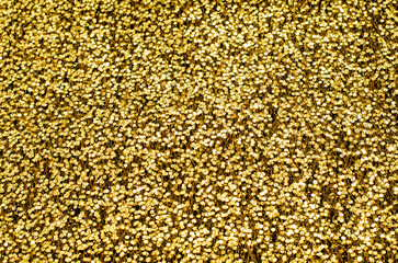 Abstract Art backgrond gold Sparkling Lights Festive background with texture. Abstract Christmas twinkled bright bokeh defocused and Falling stars. Winter Card or invitation