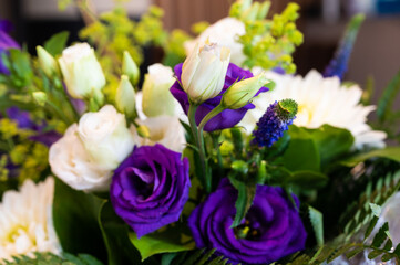 Close up of a white and purple bouquet
