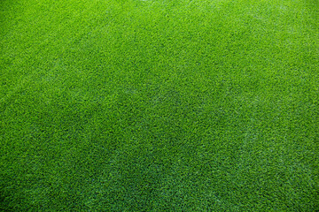 Top view of artificial green grass texture for background. Abstract concept design picture backdrop...