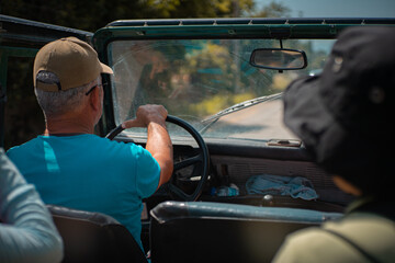 Travelling in jeep car safari  - obrazy, fototapety, plakaty