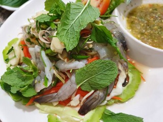Thai spicy salad with seafood