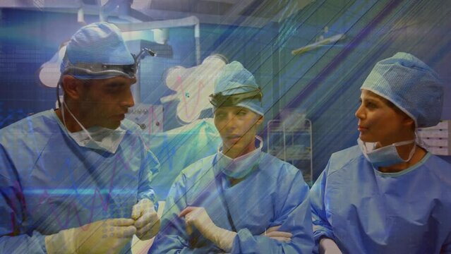Animation of life line over caucasian surgeons in operating theatre