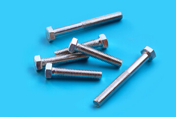 Screw isolated on blue background