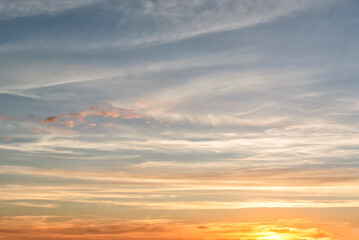 Beautiful texture (background) of the sky at sunset in warm colors. Sunrise in the morning.