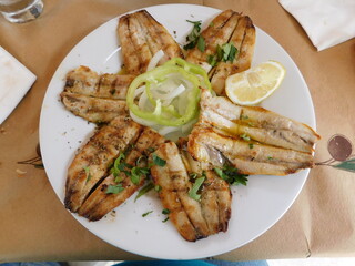Grilled sardines, served in a restaurant in Greece