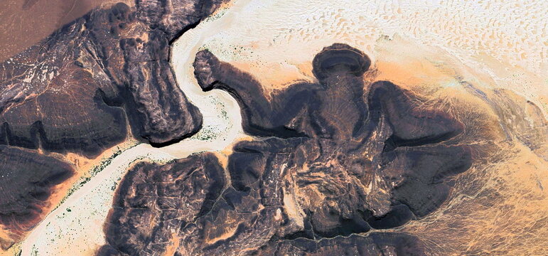 abstract landscape photo of the deserts of Africa from the air emulating the shapes and colors of elephant hunting,Genre: Abstract naturalism, from the abstract to the figurative