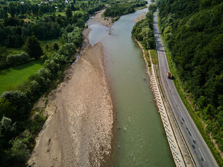 Fototapeta na wymiar Aerial view of mountain river stream with stones valley landscape, Ukraine, Carpathian, wild nature