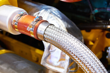 Reinforced metal hose and clamp