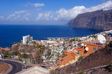Aerial view of the skyline of the coastal town of Los Gigantes in Tenerife, Canary Islands