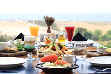 Fototapeta na wymiar Traditional Arabic breakfast | Arabic food and drinks backgrounds | Manakish | Middle East