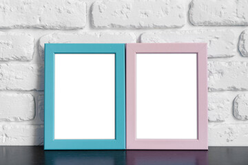 Photo frame with copy space against white brick wall