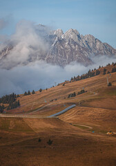 Val Seriana, its peaks, woods and autumnal landscape during an October afternoon, near the town of...