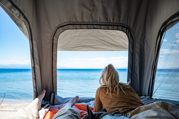 Looking out over the sea from inside the roof tent