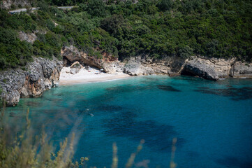 Greek beach with blue water and warm sand