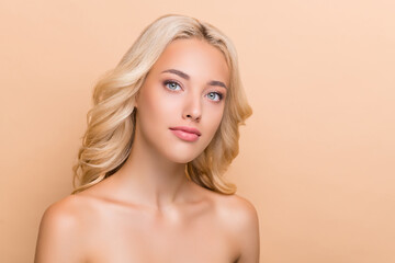 Portrait of attractive shine wavy-haired girl clear pore mask uplift effect isolated over beige...